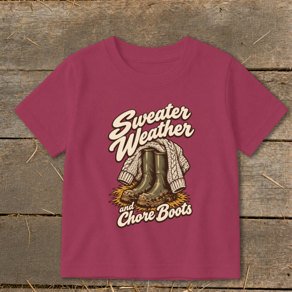 Maroon t-shirt graphic with "Sweater Weather and Chore Boots" text and illustration.