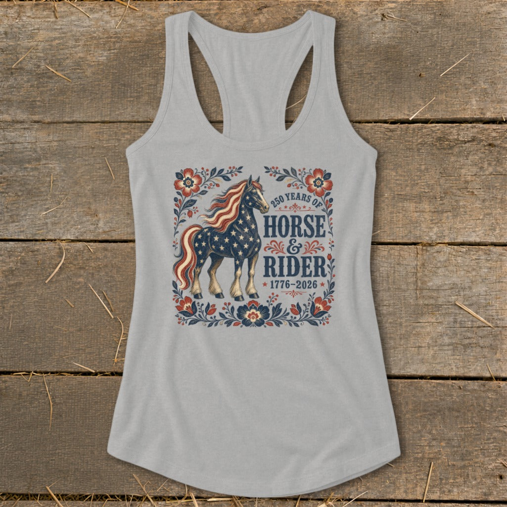 Grey tank top with a horse design featuring American flag stars and stripes, and text "250 Years of Horse & Rider 1776-2026".