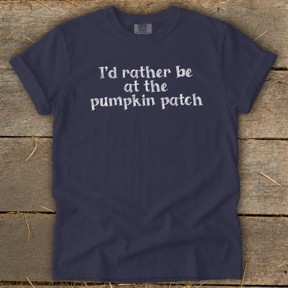 Navy t-shirt with white text that reads "I'd rather be at the pumpkin patch".