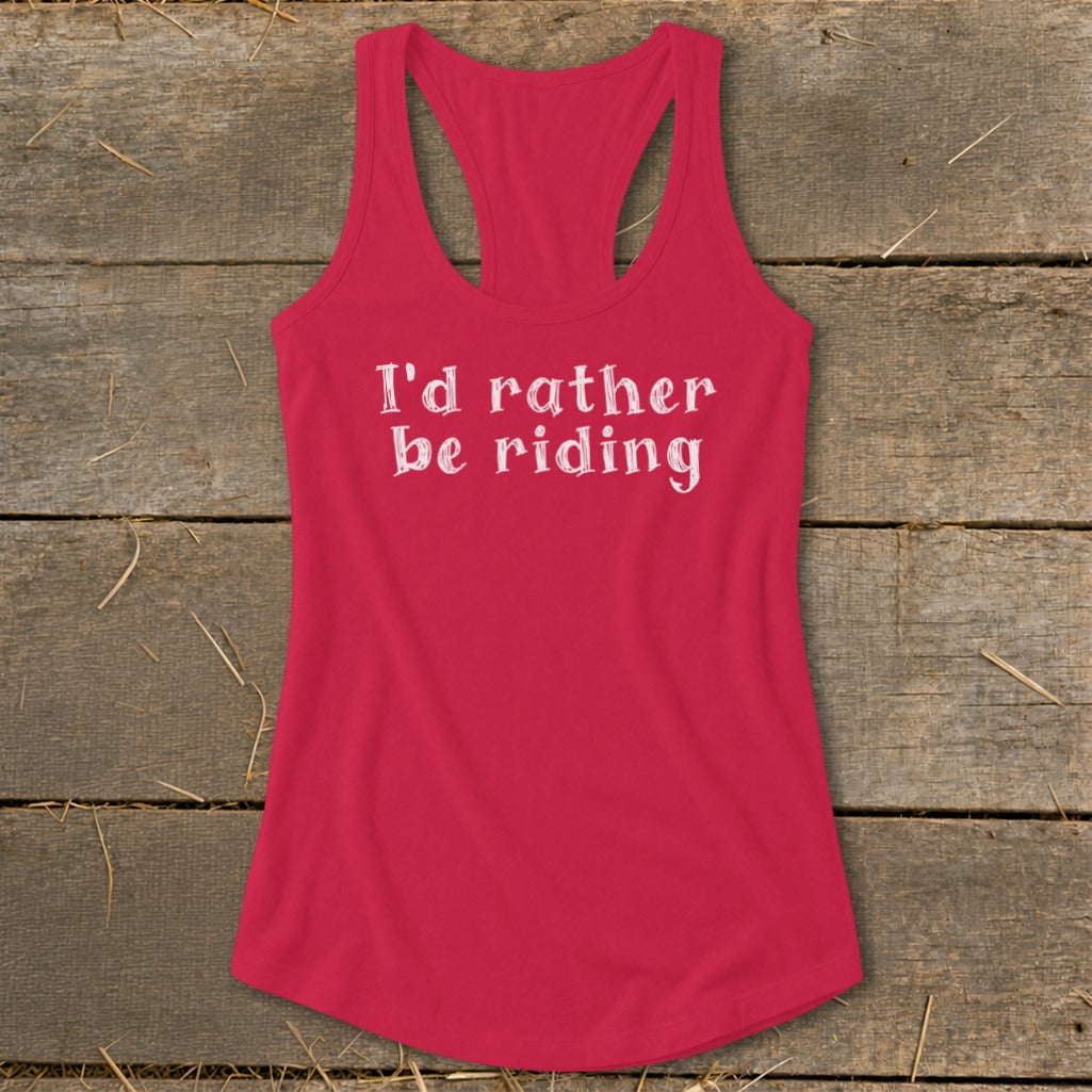 Pink racerback tank top with white text "I'd rather be riding".