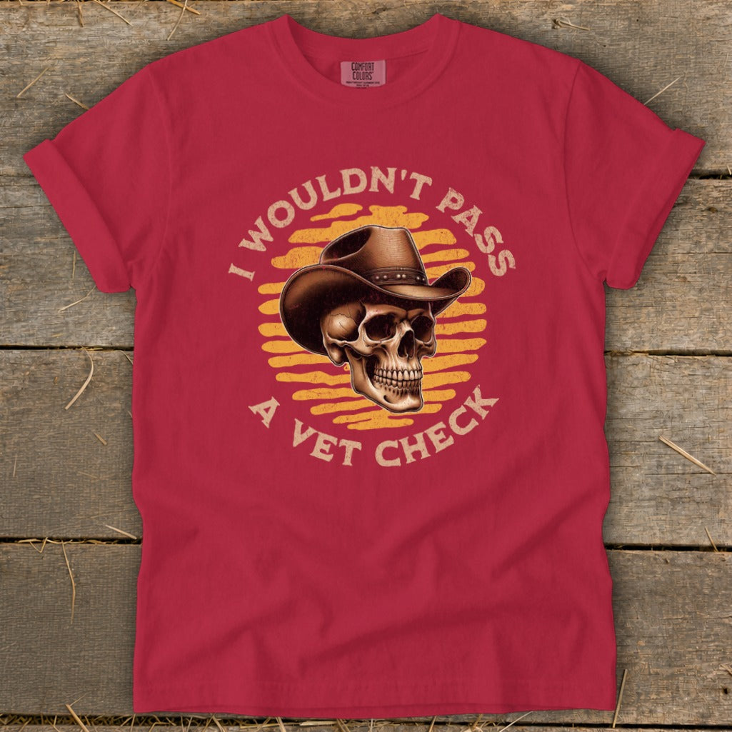 Red t-shirt with skull wearing cowboy hat graphic and text "I wouldn't pass a vet check".