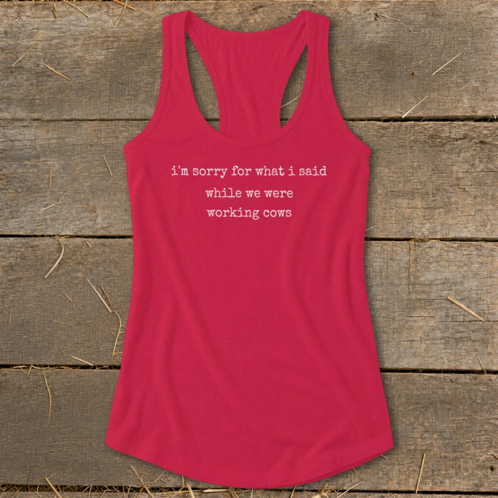 Red tank top with white text "I'm sorry for what I said while we were working cows."