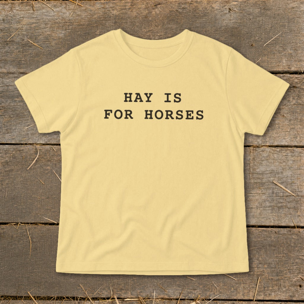 Yellow t-shirt with black text "HAY IS FOR HORSES".