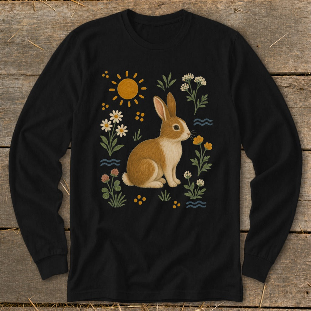Black long-sleeve shirt with a brown bunny and floral garden illustration.