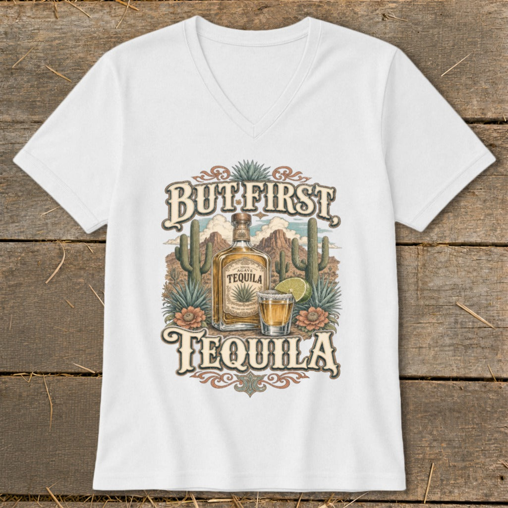 White v-neck t-shirt with "But First, Tequila" graphic featuring a bottle and shot of tequila.