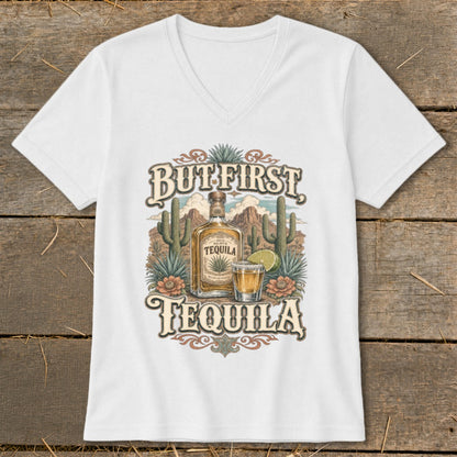 White v-neck t-shirt with "But First, Tequila" graphic featuring a bottle and shot of tequila.