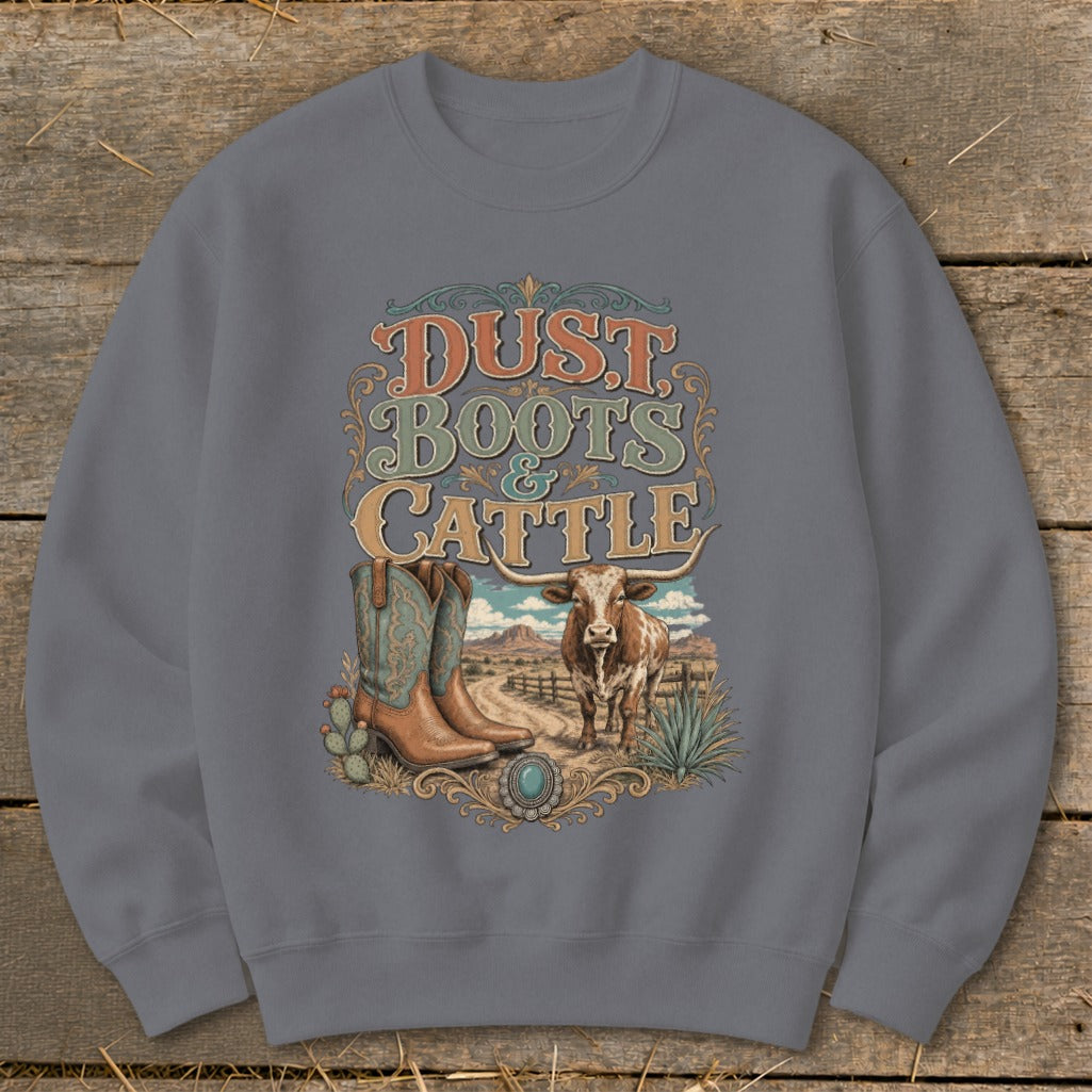 Crewneck sweatshirt with "Dust, Boots & Cattle" graphic featuring cowboy boots, a longhorn, and desert landscape.