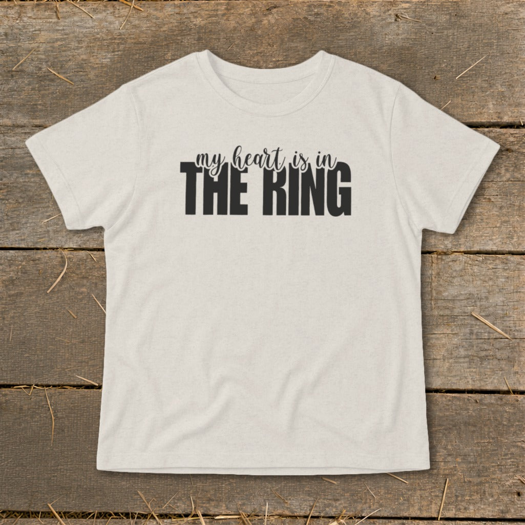 Light t-shirt with black text "my heart is in THE RING".