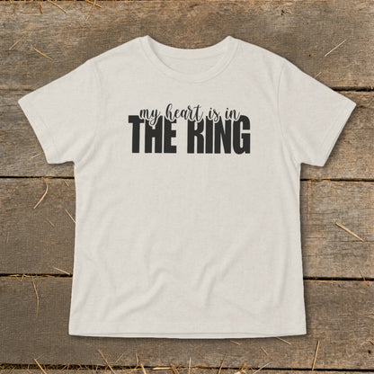 Light t-shirt with black text "my heart is in THE RING".