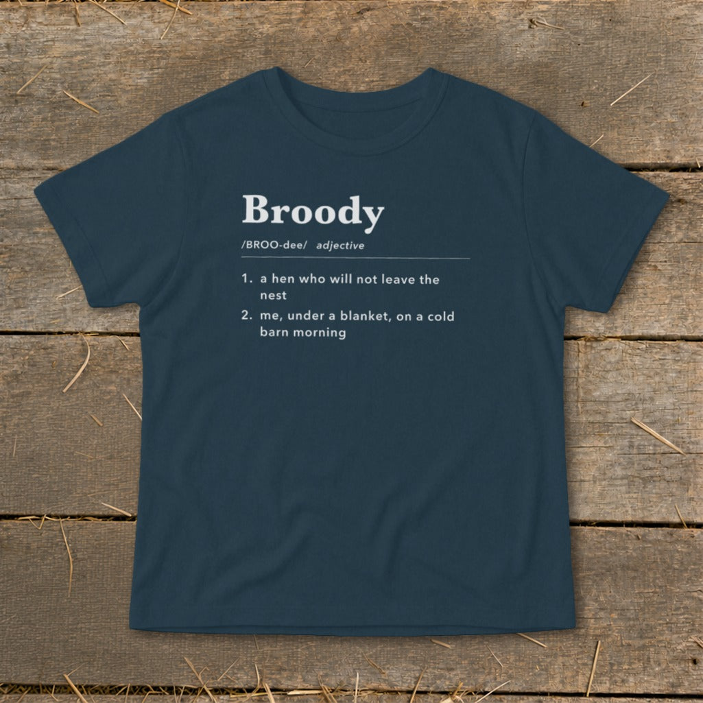 Navy t-shirt with "Broody" definition: a hen who won't leave nest, or me under a blanket.