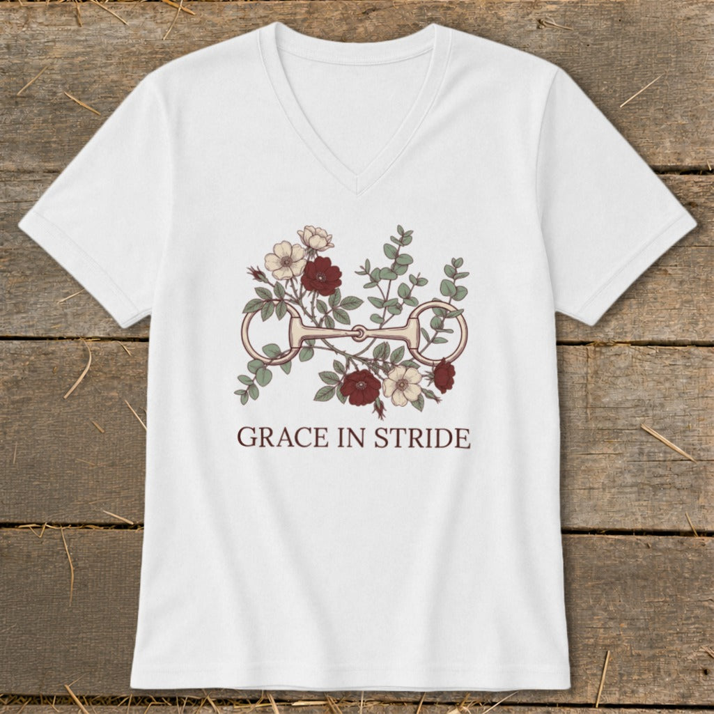 White t-shirt with floral horse bit graphic and "GRACE IN STRIDE" text.