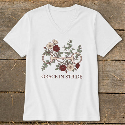 White t-shirt with floral horse bit graphic and "GRACE IN STRIDE" text.