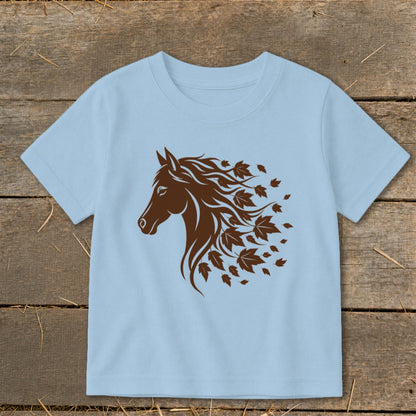 Light blue t-shirt with a brown horse head graphic with flowing mane of leaves.