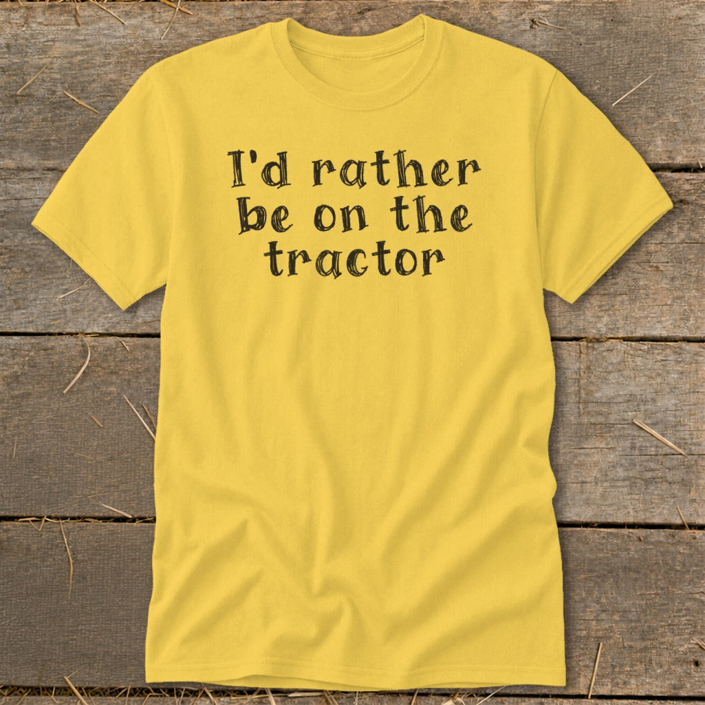 Yellow t-shirt with black text reading "I'd rather be on the tractor."