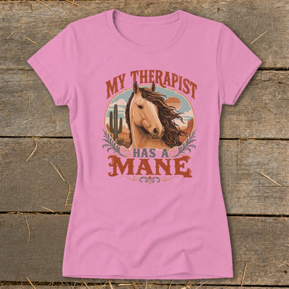 Pink t-shirt with "My Therapist Has a Mane" text and horse graphic.
