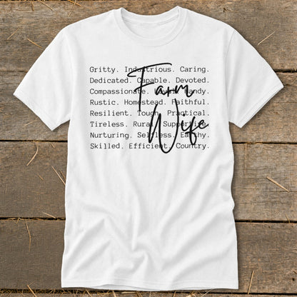White t-shirt with "Farm Wife" script and descriptive words.