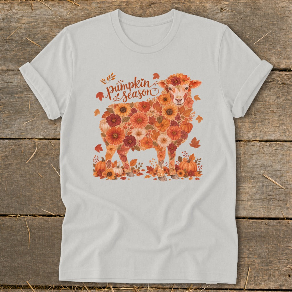 White t-shirt with a sheep graphic made of flowers and pumpkins, saying "Pumpkin season".