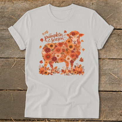 White t-shirt with a sheep graphic made of flowers and pumpkins, saying "Pumpkin season".