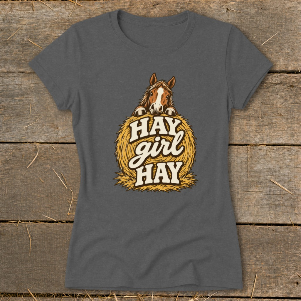 Horse peeking over hay bale with text "HAY girl HAY" on grey t-shirt.