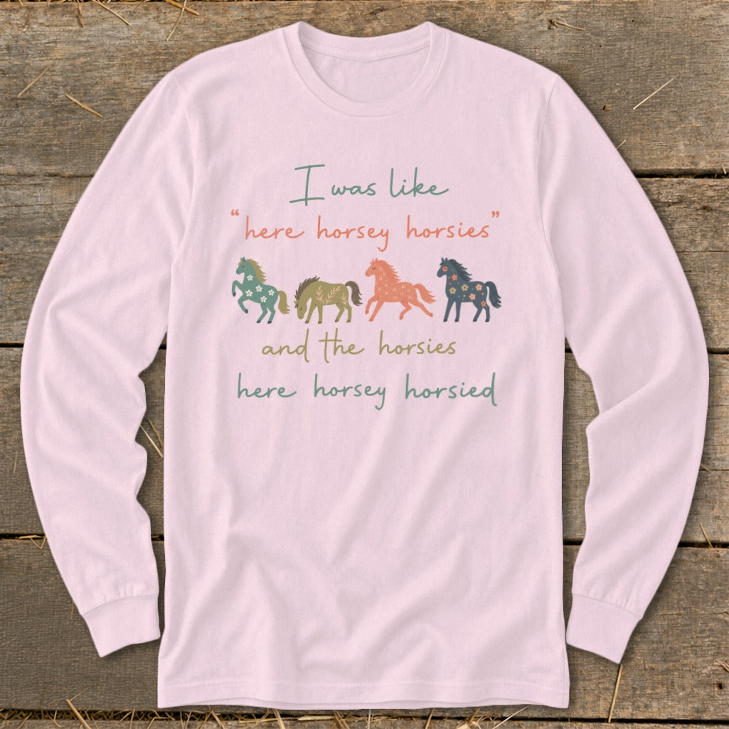 Pink long-sleeve shirt with graphic: "I was like 'here horsey horsies' and the horsies here horsey horsied"