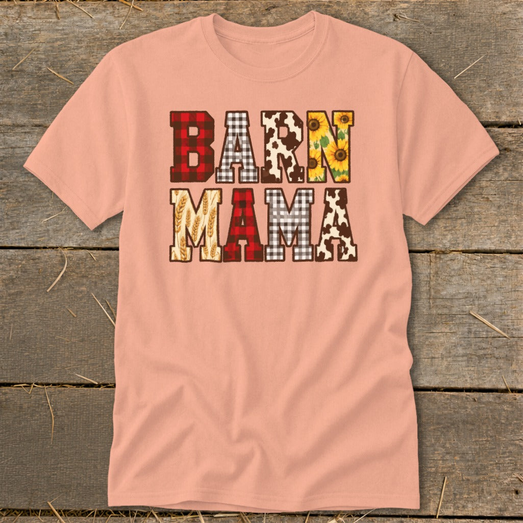 Peach t-shirt with "BARN MAMA" text featuring buffalo plaid, cow print, sunflowers, and wheat.