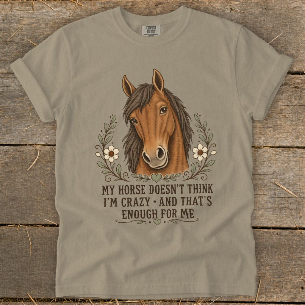 T-shirt with horse head, flowers, and text "My horse doesn't think I'm crazy".