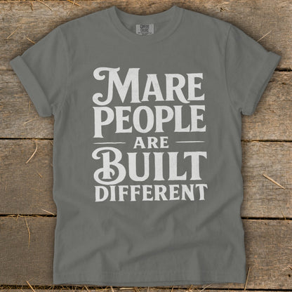 Grey t-shirt with white text: Mare People Are Built Different