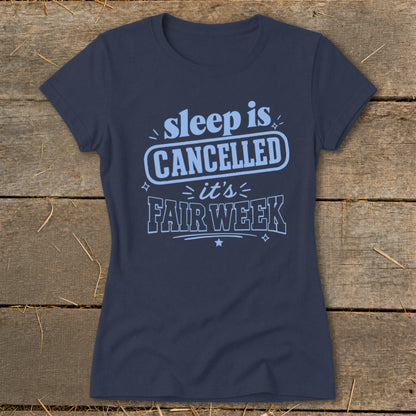 Navy t-shirt with "sleep is CANCELLED it's FAIR WEEK" text.