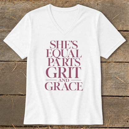 White v-neck t-shirt with "She's Equal Parts Grit and Grace" text.