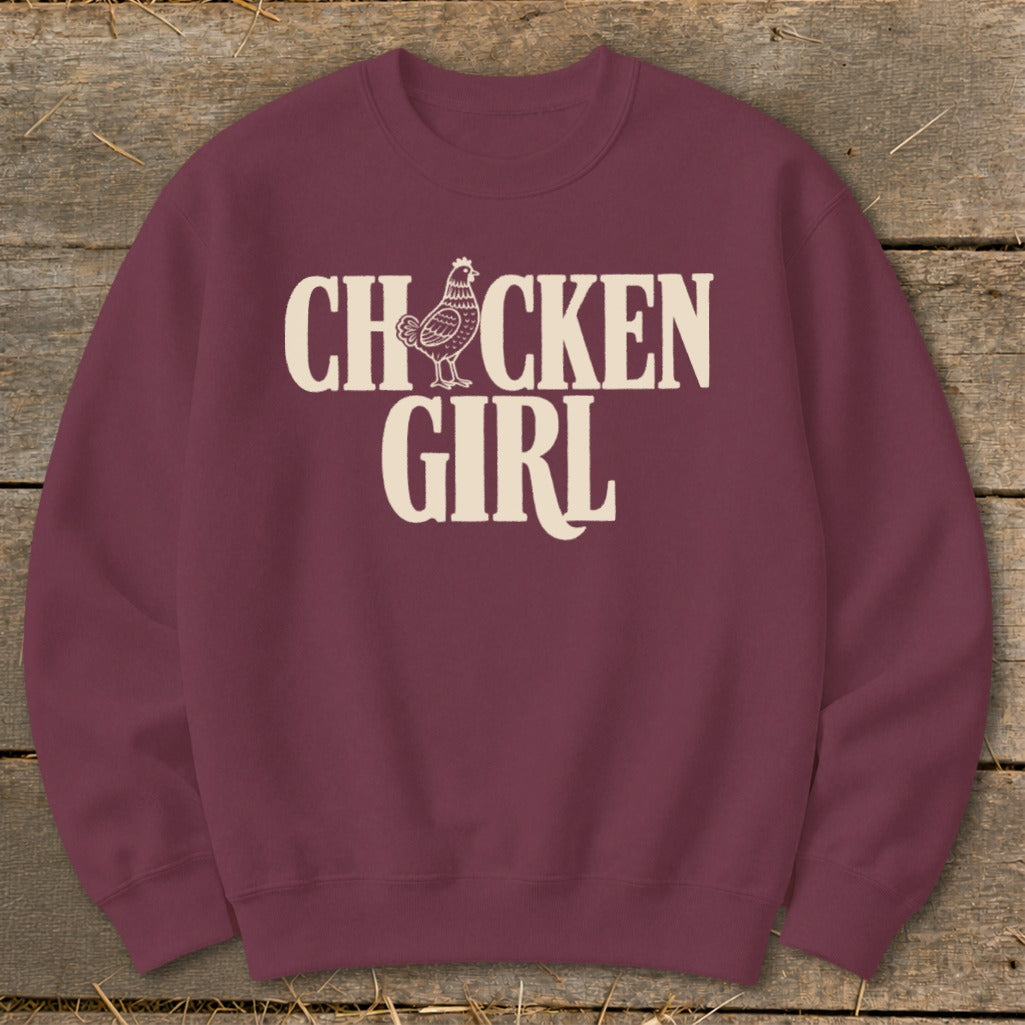 Maroon sweatshirt with "CHICKEN GIRL" text and a chicken graphic.