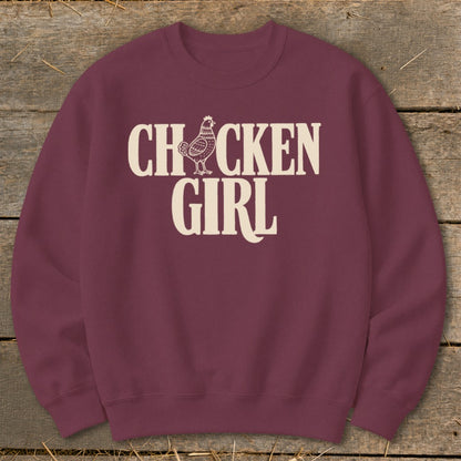 Maroon sweatshirt with "CHICKEN GIRL" text and a chicken graphic.
