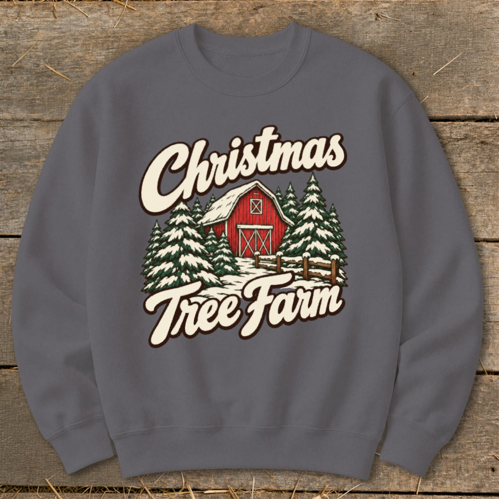 Gray sweatshirt with "Christmas Tree Farm" text and a winter barn and tree scene graphic.