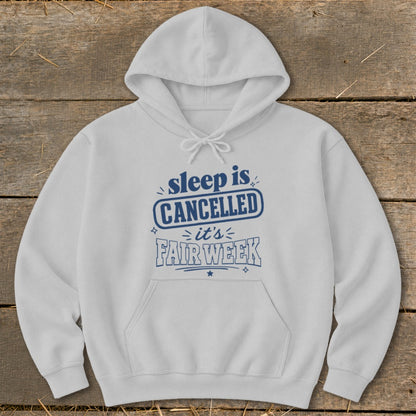 White hoodie with blue text that says "sleep is CANCELLED it's FAIR WEEK".