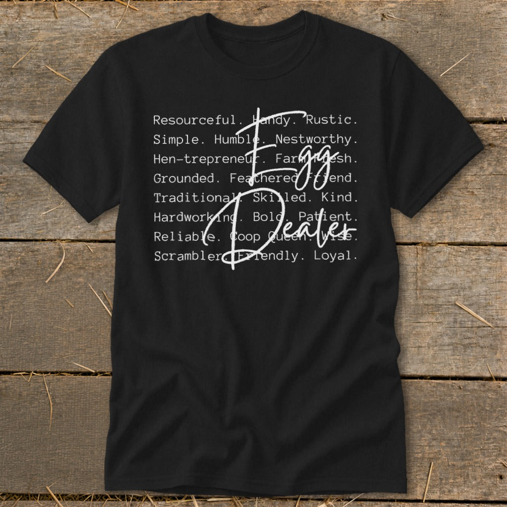 Black t-shirt with "Egg Dealer" text listing farm-related qualities.