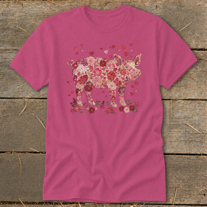 Pink t-shirt featuring a pig silhouette made of pink and red flowers and hearts.