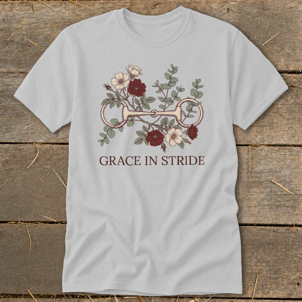 Light grey t-shirt with horse bit, flowers, and "Grace in Stride" text.