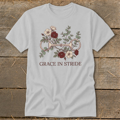 Light grey t-shirt with horse bit, flowers, and "Grace in Stride" text.