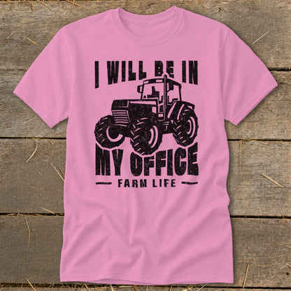 Pink t-shirt with black graphic of tractor and text: "I WILL BE IN MY OFFICE FARM LIFE"