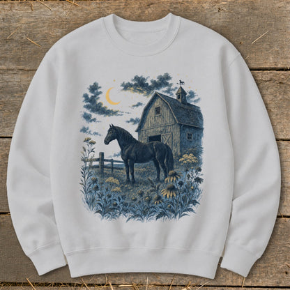 White sweatshirt with barn, horse, and crescent moon graphic.