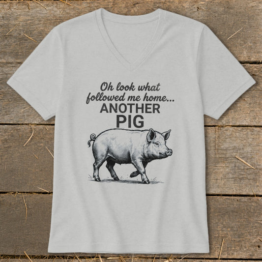 Light gray v-neck t-shirt with pig graphic and text "Oh look what followed me home... ANOTHER PIG".