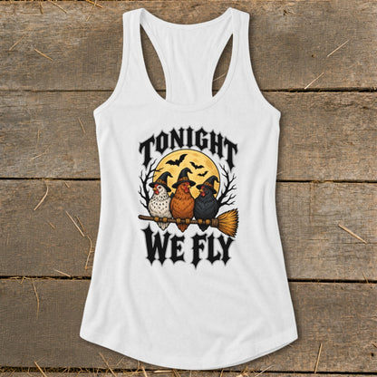 White tank top with three chickens wearing witch hats on a broomstick with "TONIGHT WE FLY" text.