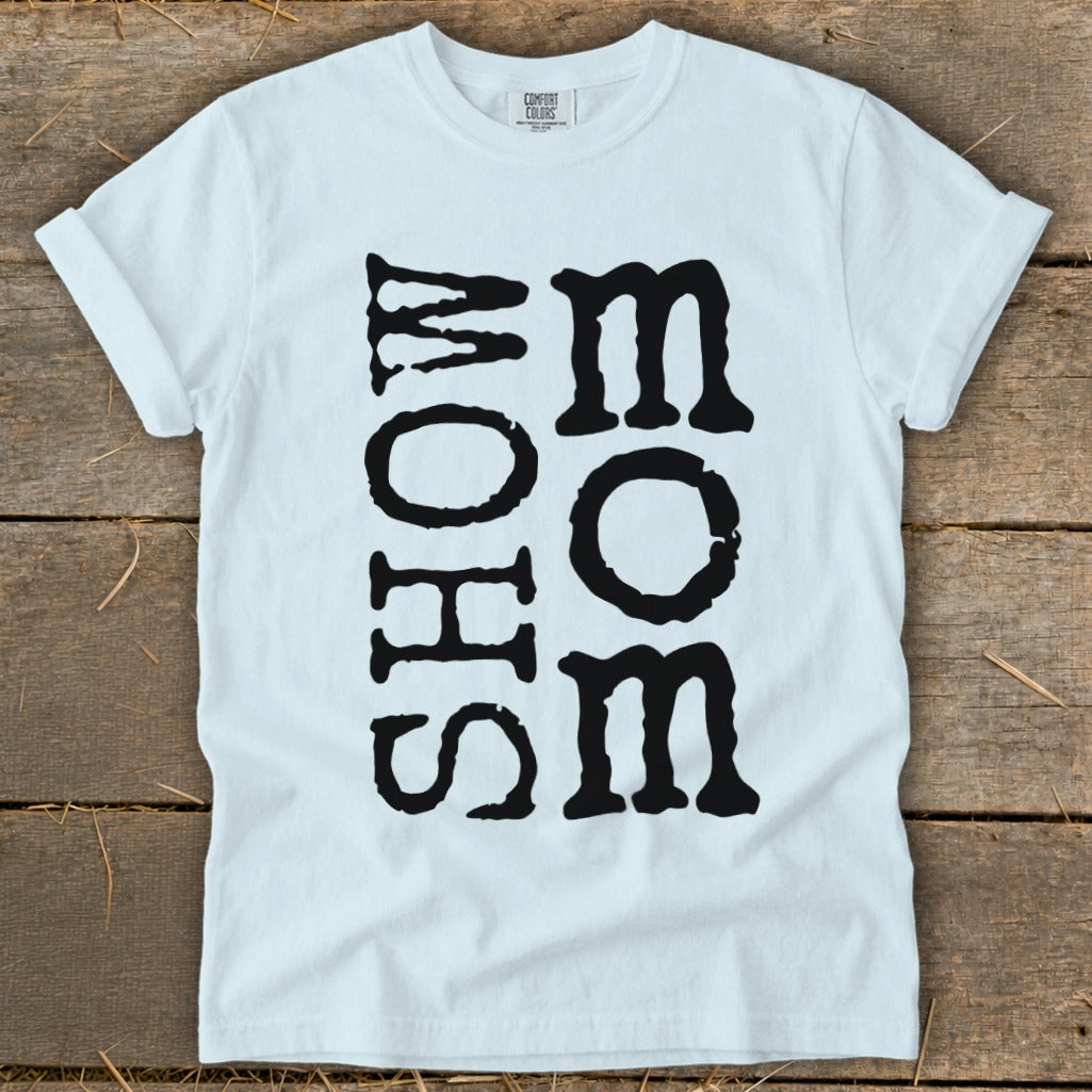 White t-shirt with black text that reads "MOM" vertically