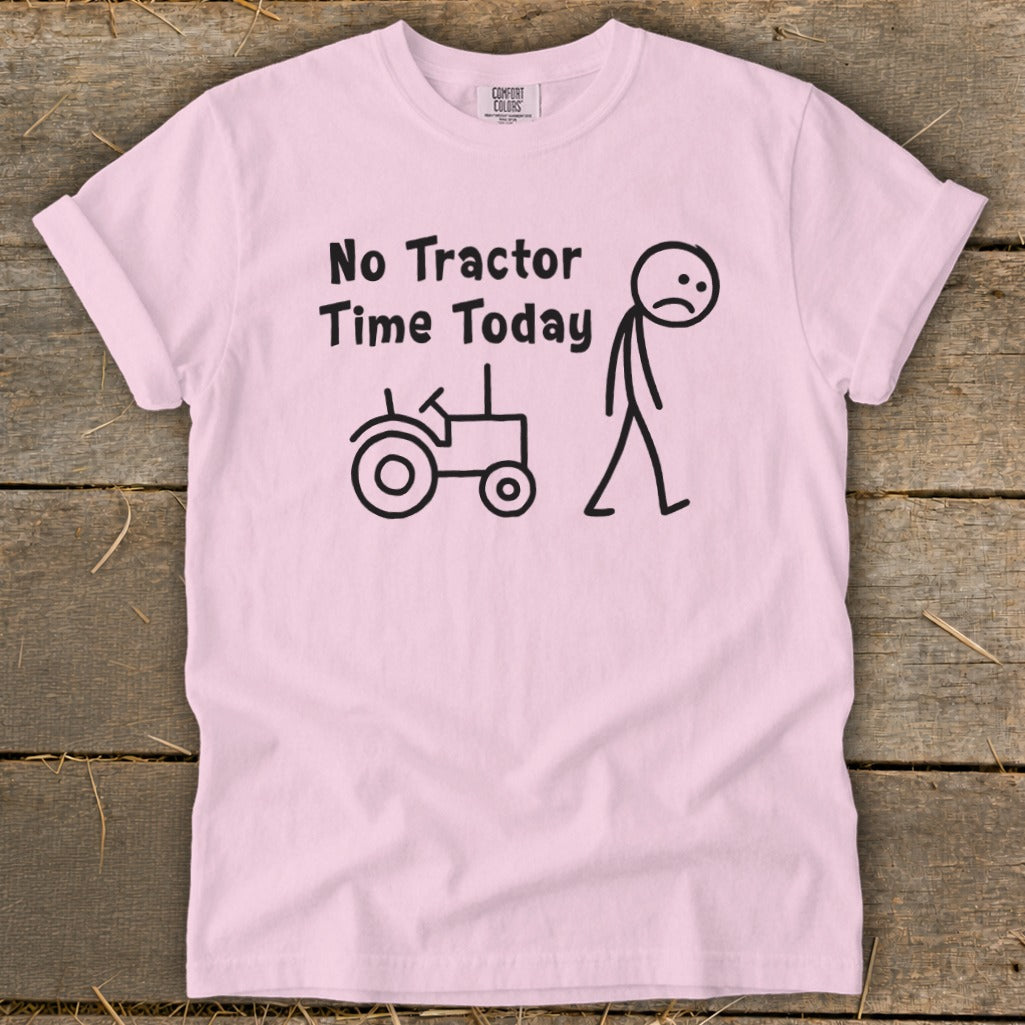 Pink t-shirt with black text and stick figures of a tractor and sad person.