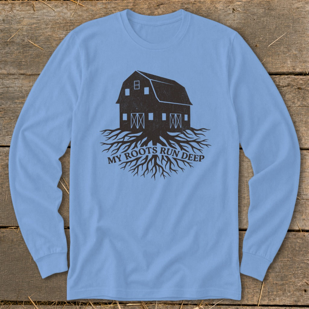 Light blue long sleeve shirt with a barn and roots graphic and "My Roots Run Deep" text.