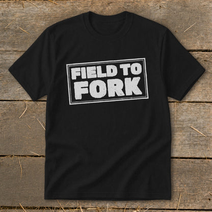 Black t-shirt featuring the white text FIELD TO FORK enclosed in a double-lined rectangular box.