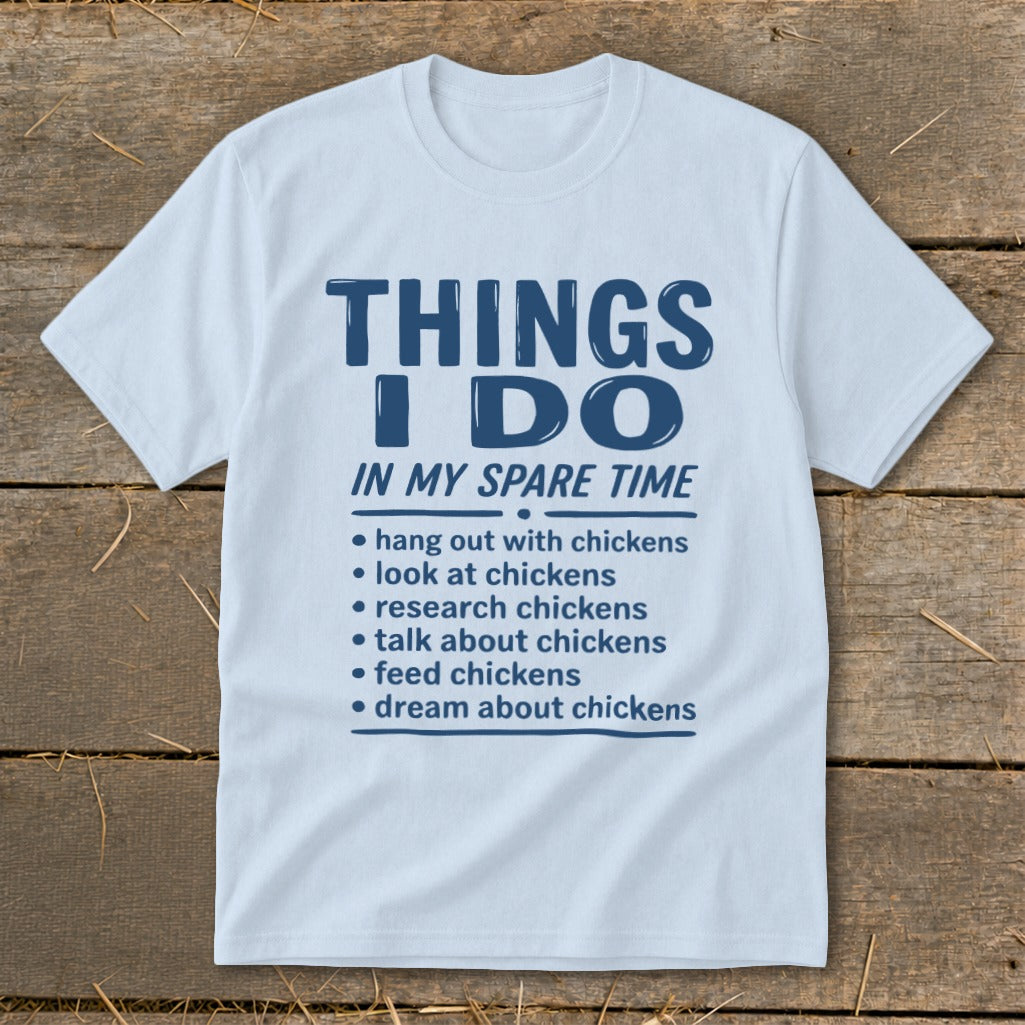 White t-shirt with "Things I Do In My Spare Time" and chicken-related activities.