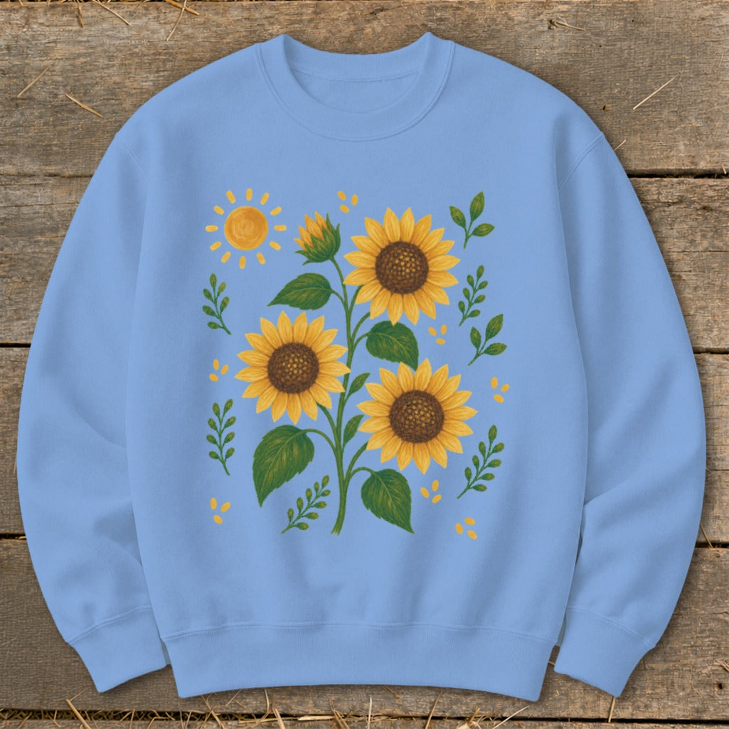 Light blue crewneck sweatshirt with a sunflower and sun graphic.