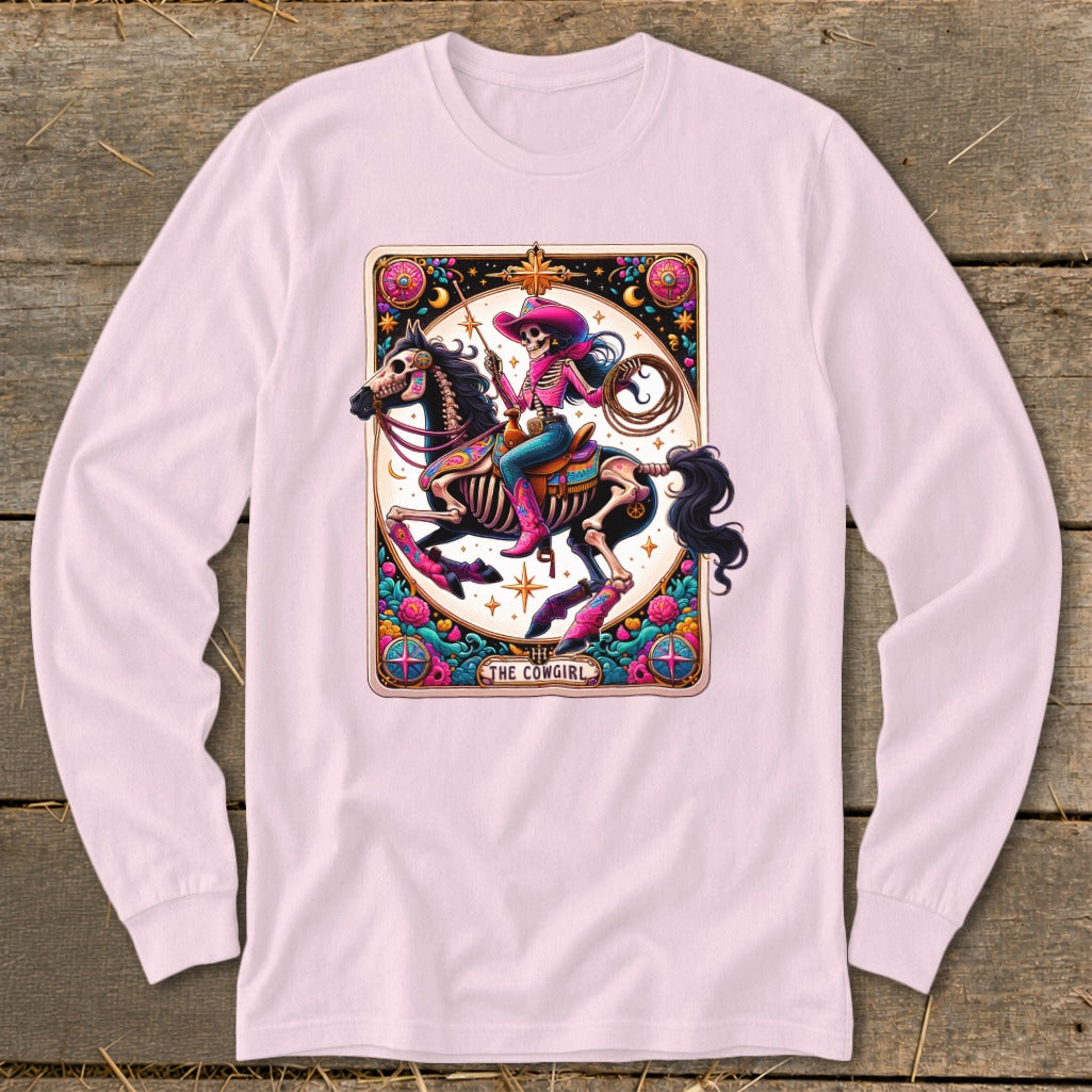 Skeleton cowgirl in pink hat and boots riding a horse, with "THE COWGIRL" text.
