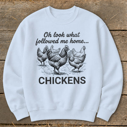 Light blue sweatshirt with chickens graphic and text "Oh look what followed me home... CHICKENS."
