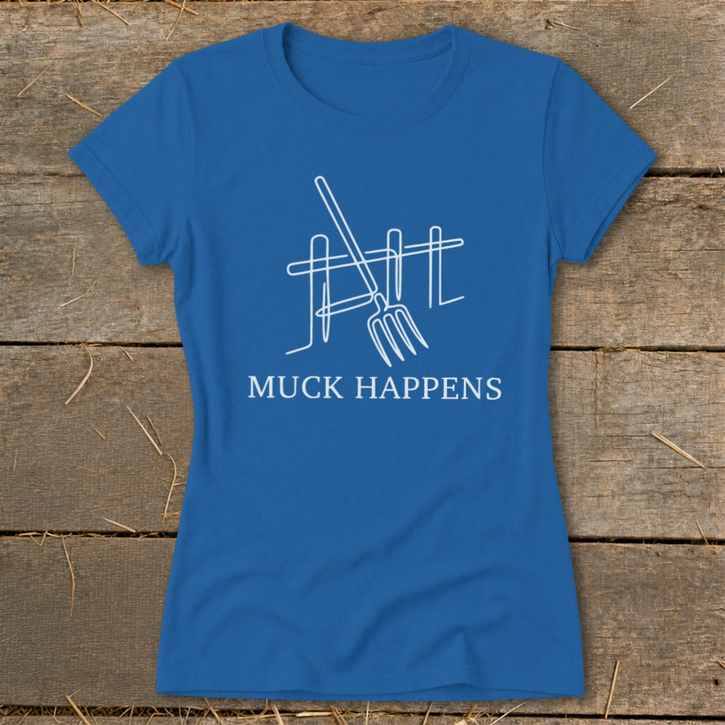 Blue t-shirt with white line art of a pitchfork against a fence and the text "MUCK HAPPENS."